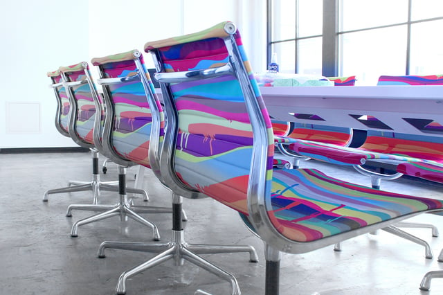 Herman Miller conference chairs in Threadless's custom upholstery.